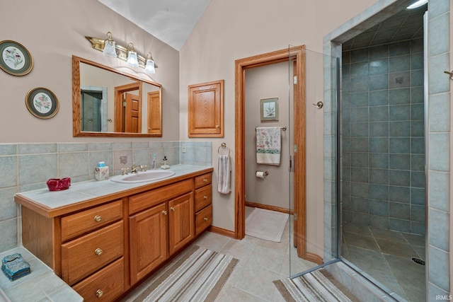 4705 Haven Ct, West Lafayette, IN 47906 - full bathroom featuring vanity, tile patterned flooring, a shower stall, and lofted ceiling