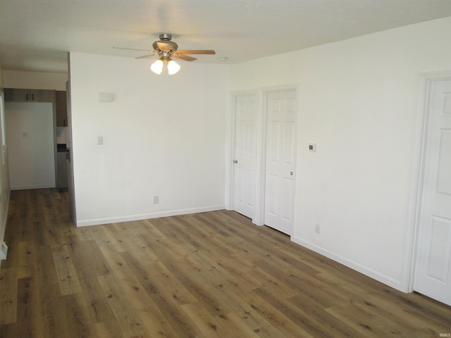 712 Hubbard St, Mishawaka, IN 46544 - spare room with ceiling fan, wood finished floors, and baseboards