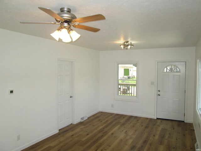 712 Hubbard St, Mishawaka, IN 46544 - entryway featuring wood finished floors, baseboards, and ceiling fan