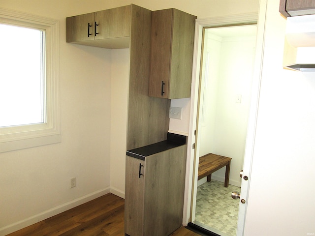 712 Hubbard St, Mishawaka, IN 46544 - kitchen with baseboards and dark wood finished floors