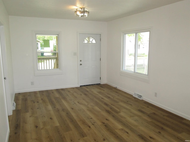 712 Hubbard St, Mishawaka, IN 46544 - foyer entrance featuring healthy amount of natural light, wood finished floors, and baseboards