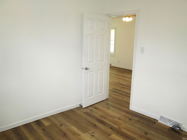 712 Hubbard St, Mishawaka, IN 46544 - empty room featuring wood finished floors and baseboards