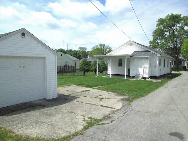 712 Hubbard St, Mishawaka, IN 46544 - garage featuring concrete driveway