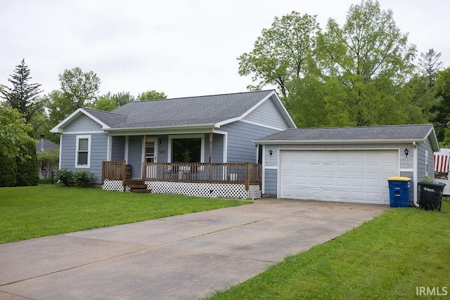 509 N Mckenzie St, Muncie, IN 47304 - ranch-style house with covered porch, a front lawn, concrete driveway, a shingled roof, and an attached garage