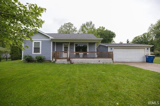 509 N Mckenzie St, Muncie, IN 47304 - ranch-style home with a porch, a front yard, driveway, and a garage