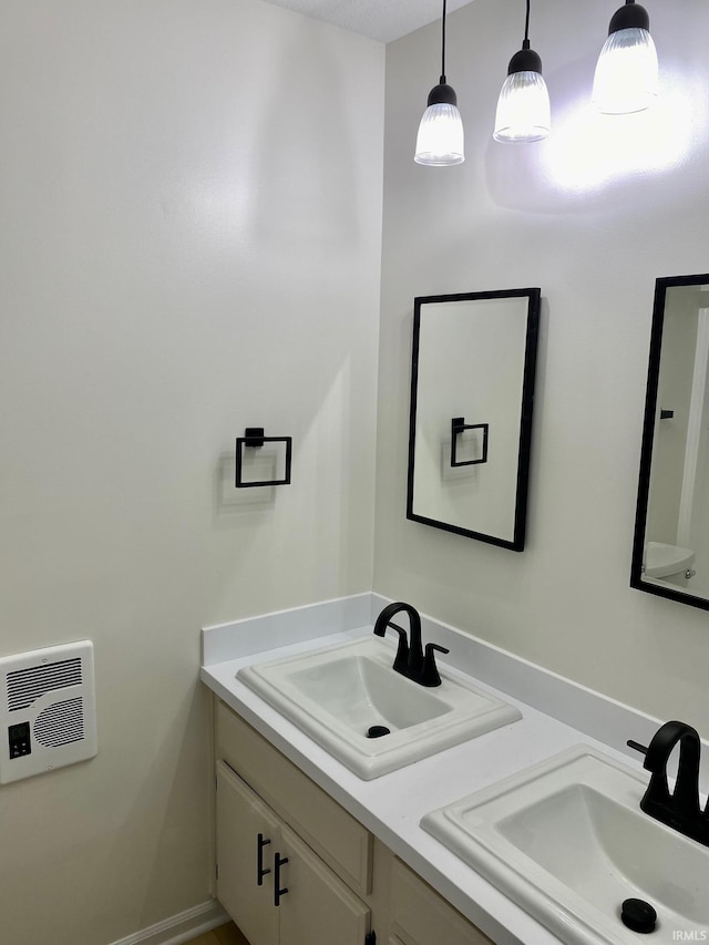 4605 Merriam Park Dr, Fort Wayne, IN 46816 - bathroom featuring double vanity and heating unit