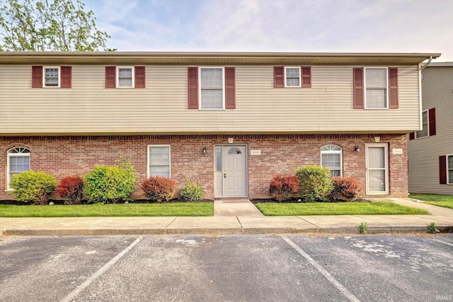 3491 S Oaklawn Cir, Bloomington, IN 47401 - view of front of property with uncovered parking and brick siding