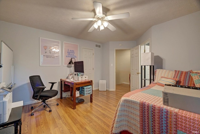 3491 S Oaklawn Cir, Bloomington, IN 47401 - bedroom featuring light wood-type flooring, ceiling fan, and baseboards