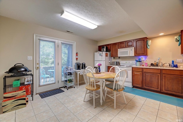 3491 S Oaklawn Cir, Bloomington, IN 47401 - dining space featuring light tile patterned flooring and a textured ceiling
