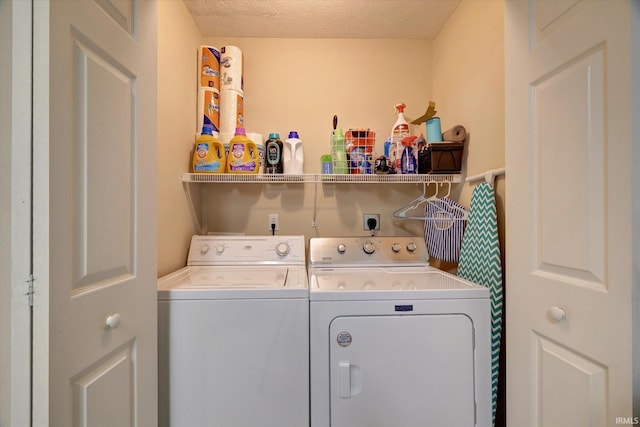 3491 S Oaklawn Cir, Bloomington, IN 47401 - washroom with washer and dryer and a textured ceiling