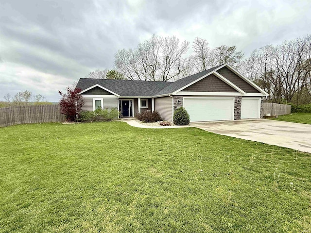 310 Main St, Lagro, IN 46941 - view of front of house featuring a garage, concrete driveway, and roof with shingles