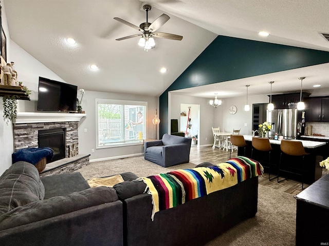 310 Main St, Lagro, IN 46941 - living room with a fireplace, a ceiling fan, baseboards, recessed lighting, and wood finished floors