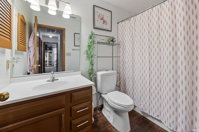 821 Lagrange St, West Lafayette, IN 47906 - full bathroom featuring toilet, vanity, wood finished floors, and a shower with shower curtain