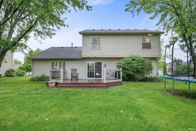821 Lagrange St, West Lafayette, IN 47906 - rear view of property featuring a trampoline, a deck, and a lawn