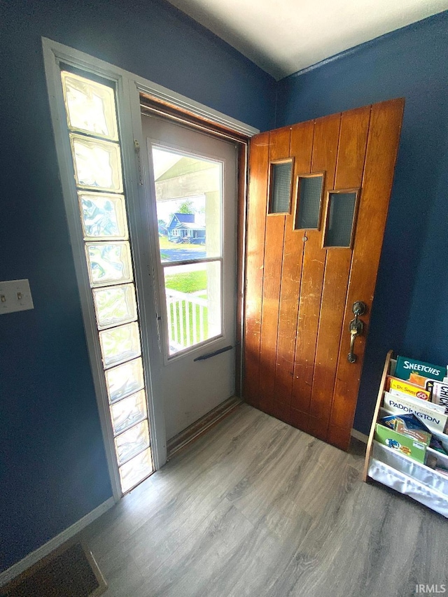 589 2nd St NW, Linton, IN 47441 - doorway to outside with light wood finished floors