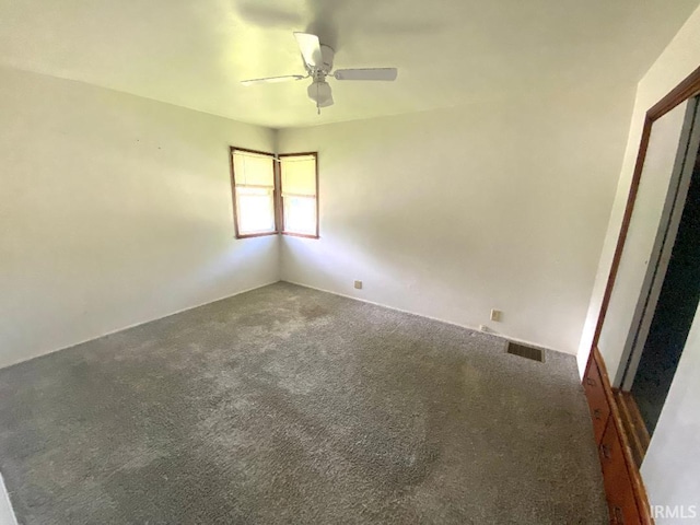 589 2nd St NW, Linton, IN 47441 - carpeted spare room with a ceiling fan