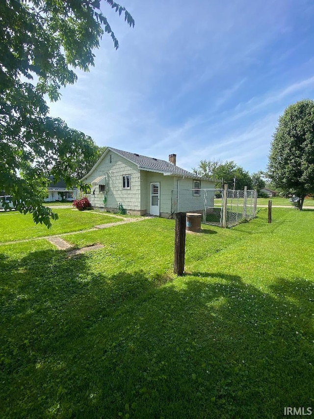 589 2nd St NW, Linton, IN 47441 - back of property featuring a chimney