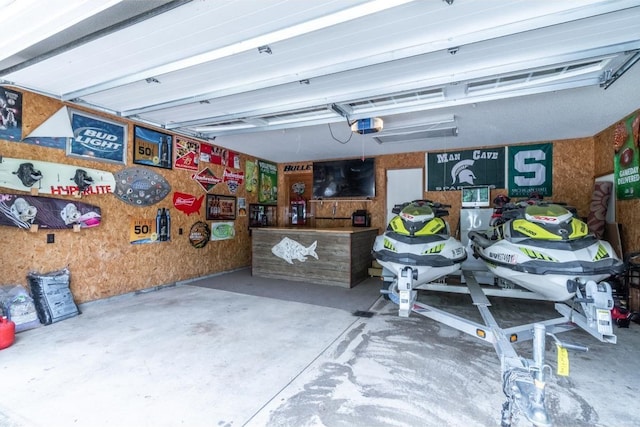 705 Pine Run, Angola, IN 46703 - garage featuring a garage door opener