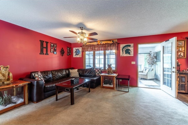 705 Pine Run, Angola, IN 46703 - living area with a textured ceiling, carpet flooring, and a ceiling fan