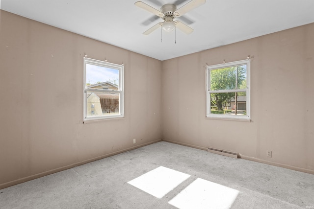 1725 W Saxon Dr, Marion, IN 46952 - unfurnished room with carpet, a baseboard heating unit, a ceiling fan, and baseboards