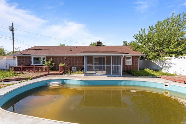 1725 W Saxon Dr, Marion, IN 46952 - view of pool with a sunroom and a deck