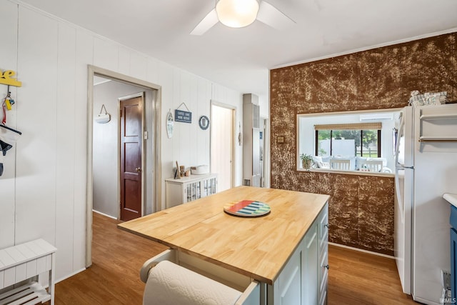 96 Ems B61I Ln, Warsaw, IN 46582 - dining room featuring wood finished floors, ceiling fan, and baseboards