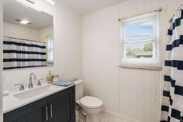 96 Ems B61I Ln, Warsaw, IN 46582 - bathroom with vanity, toilet, marble finish flooring, curtained shower, and wooden walls