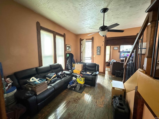 417 S Elliott St, Muncie, IN 47305 - living area with ceiling fan, hardwood / wood-style flooring, and a textured ceiling