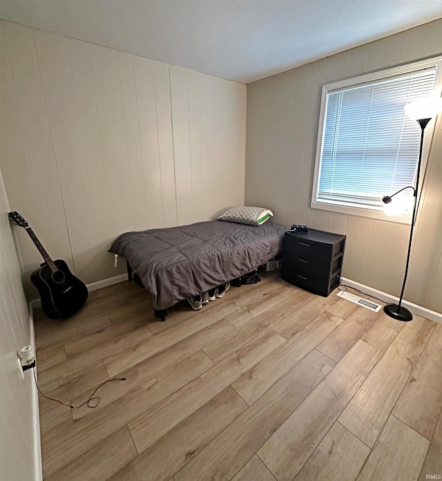 402 Sheridan St, Loogootee, IN 47553 - bedroom featuring light wood-style floors