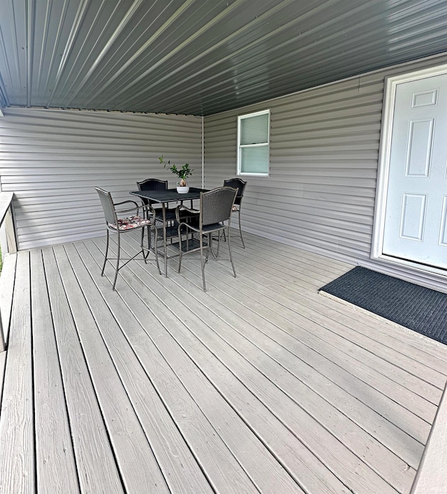 402 Sheridan St, Loogootee, IN 47553 - wooden terrace featuring outdoor dining space