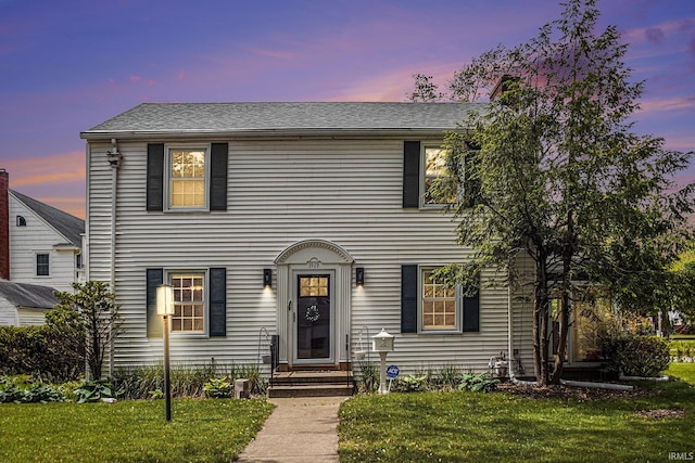 1919 Kessler Blvd, South Bend, IN 46616 - view of front of home featuring a lawn
