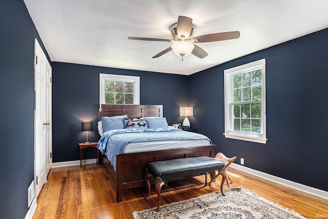 1919 Kessler Blvd, South Bend, IN 46616 - bedroom with wood finished floors, ceiling fan, and baseboards