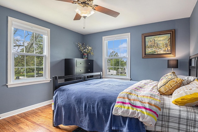 1919 Kessler Blvd, South Bend, IN 46616 - bedroom featuring wood finished floors, baseboards, and a ceiling fan