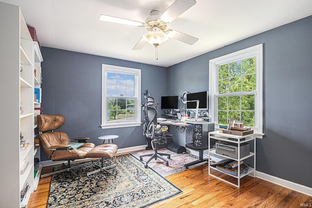 1919 Kessler Blvd, South Bend, IN 46616 - office area with healthy amount of natural light, wood finished floors, a ceiling fan, and baseboards