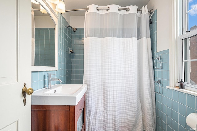 1919 Kessler Blvd, South Bend, IN 46616 - bathroom featuring tile walls, a shower with shower curtain, and vanity