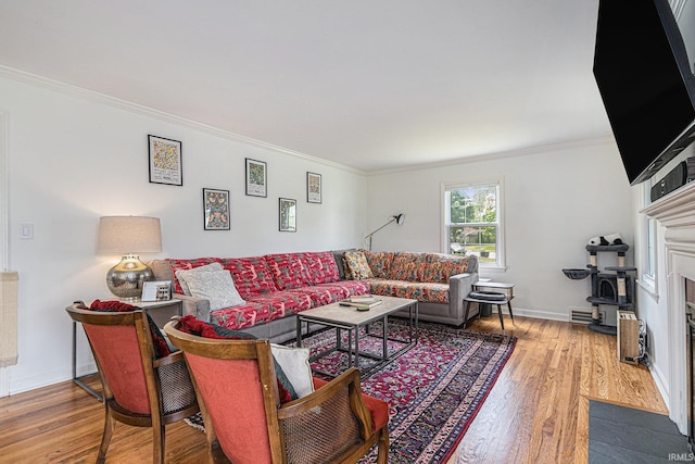 1919 Kessler Blvd, South Bend, IN 46616 - living room featuring wood finished floors, crown molding, baseboards, and a fireplace with flush hearth