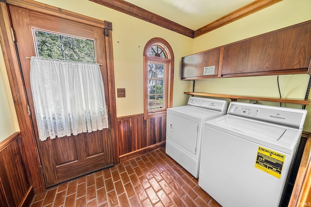 3619 Sullivan Ct, South Bend, IN 46614 - laundry area with cabinet space, a wainscoted wall, brick patterned floors, separate washer and dryer, and wood walls