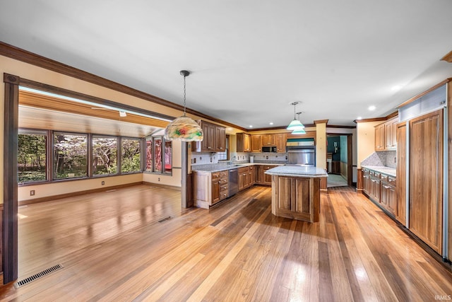 3619 Sullivan Ct, South Bend, IN 46614 - kitchen with oven, ornamental molding, dishwasher, light countertops, and light wood-type flooring
