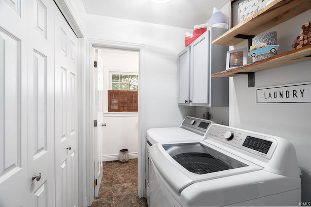 3599 Canterbury Dr, Lafayette, IN 47909 - washroom with cabinet space, washing machine and clothes dryer, and baseboards