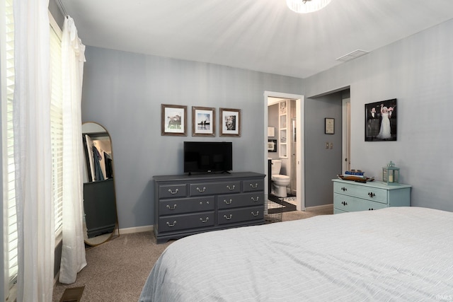 3599 Canterbury Dr, Lafayette, IN 47909 - bedroom with carpet flooring, baseboards, and ensuite bath