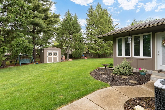 3599 Canterbury Dr, Lafayette, IN 47909 - view of yard with central air condition unit and a playground