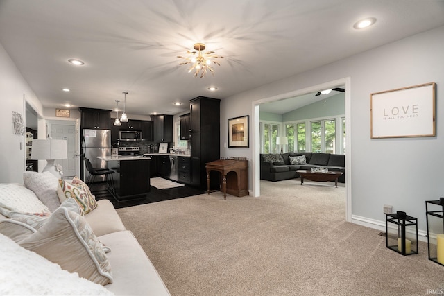 3599 Canterbury Dr, Lafayette, IN 47909 - living room with baseboards, recessed lighting, carpet floors, vaulted ceiling, and a chandelier