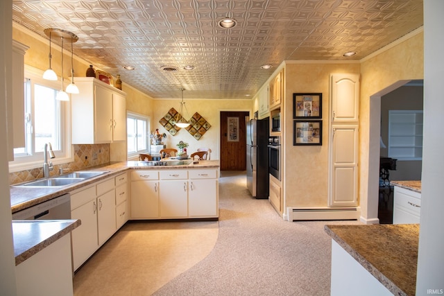 6064 E 300 N, Union City, IN 47390 - kitchen featuring a sink, an ornate ceiling, baseboard heating, stainless steel appliances, and ornamental molding