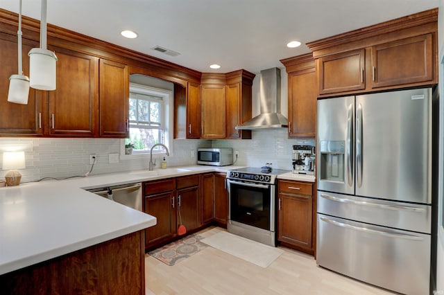 1444 Field Crest Ln, Jasper, IN 47546 - kitchen featuring stainless steel appliances, wall chimney range hood, a sink, light countertops, and recessed lighting