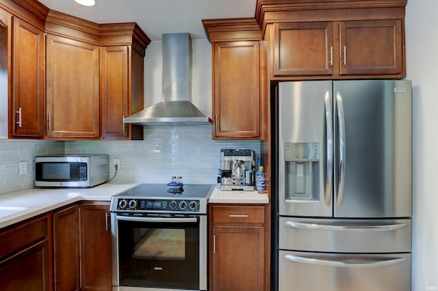 1444 Field Crest Ln, Jasper, IN 47546 - kitchen with appliances with stainless steel finishes, wall chimney range hood, backsplash, light countertops, and recessed lighting