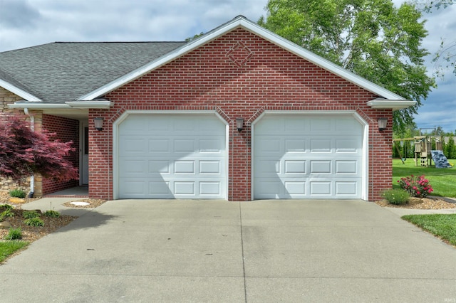 1444 Field Crest Ln, Jasper, IN 47546 - garage featuring concrete driveway