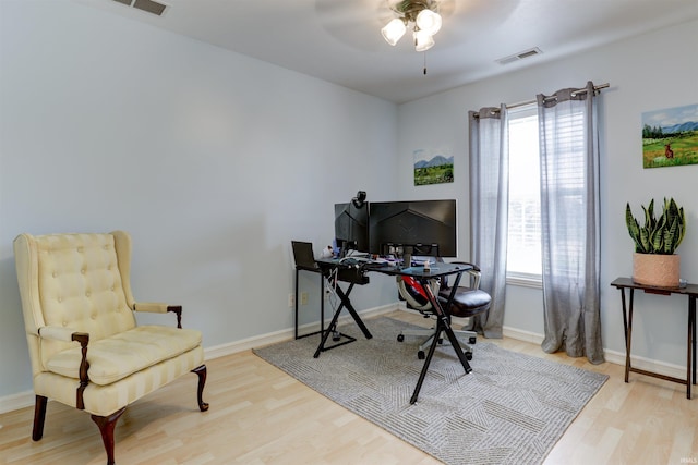 1444 Field Crest Ln, Jasper, IN 47546 - office area with wood finished floors, a ceiling fan, and baseboards