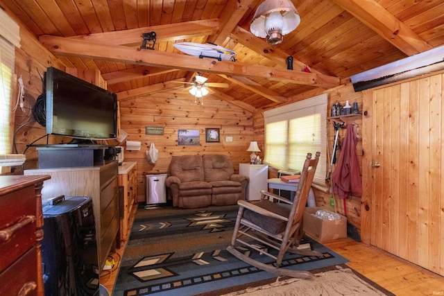 11029 E 350 S, Lagrange, IN 46761 - living room featuring hardwood / wood-style flooring, wood walls, ceiling fan, and wood ceiling