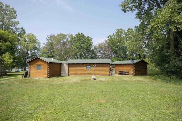 11029 E 350 S, Lagrange, IN 46761 - rear view of property featuring a yard and log siding