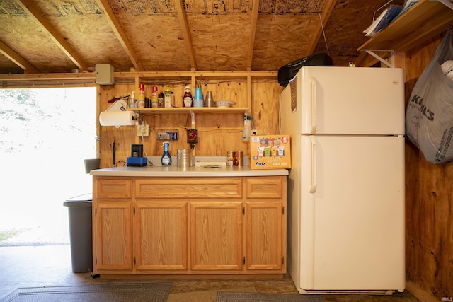 11029 E 350 S, Lagrange, IN 46761 - kitchen with freestanding refrigerator, light countertops, and open shelves